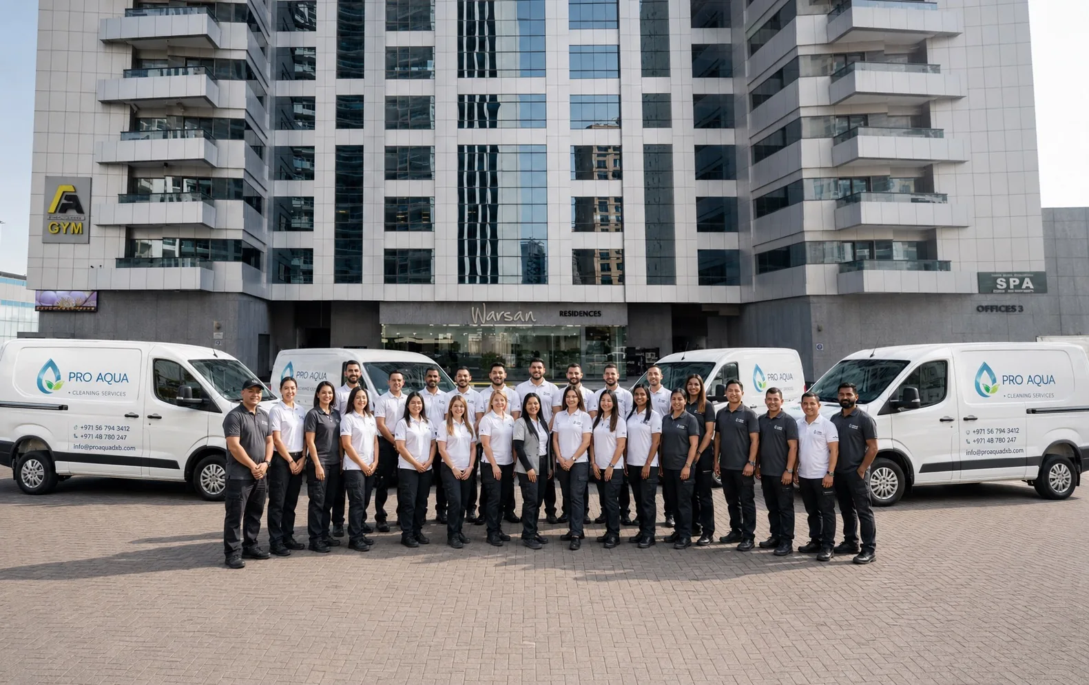 Pro Aqua Dubai team with branded service vans